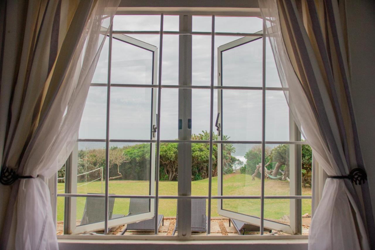 Umzumbe Surf House Lodge *